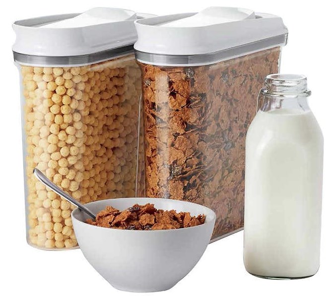 Milk and Cerreal Containers filled behind bowl