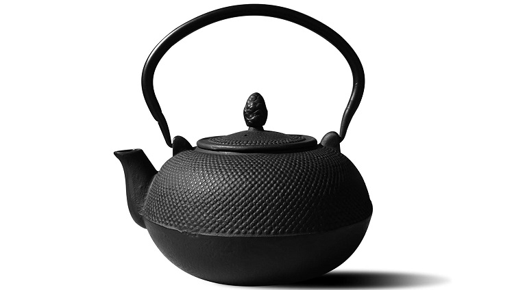 black cast iron teapot