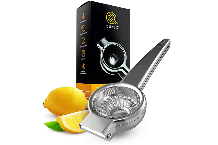 stainless steel lemon squeezer styled next to original packagin