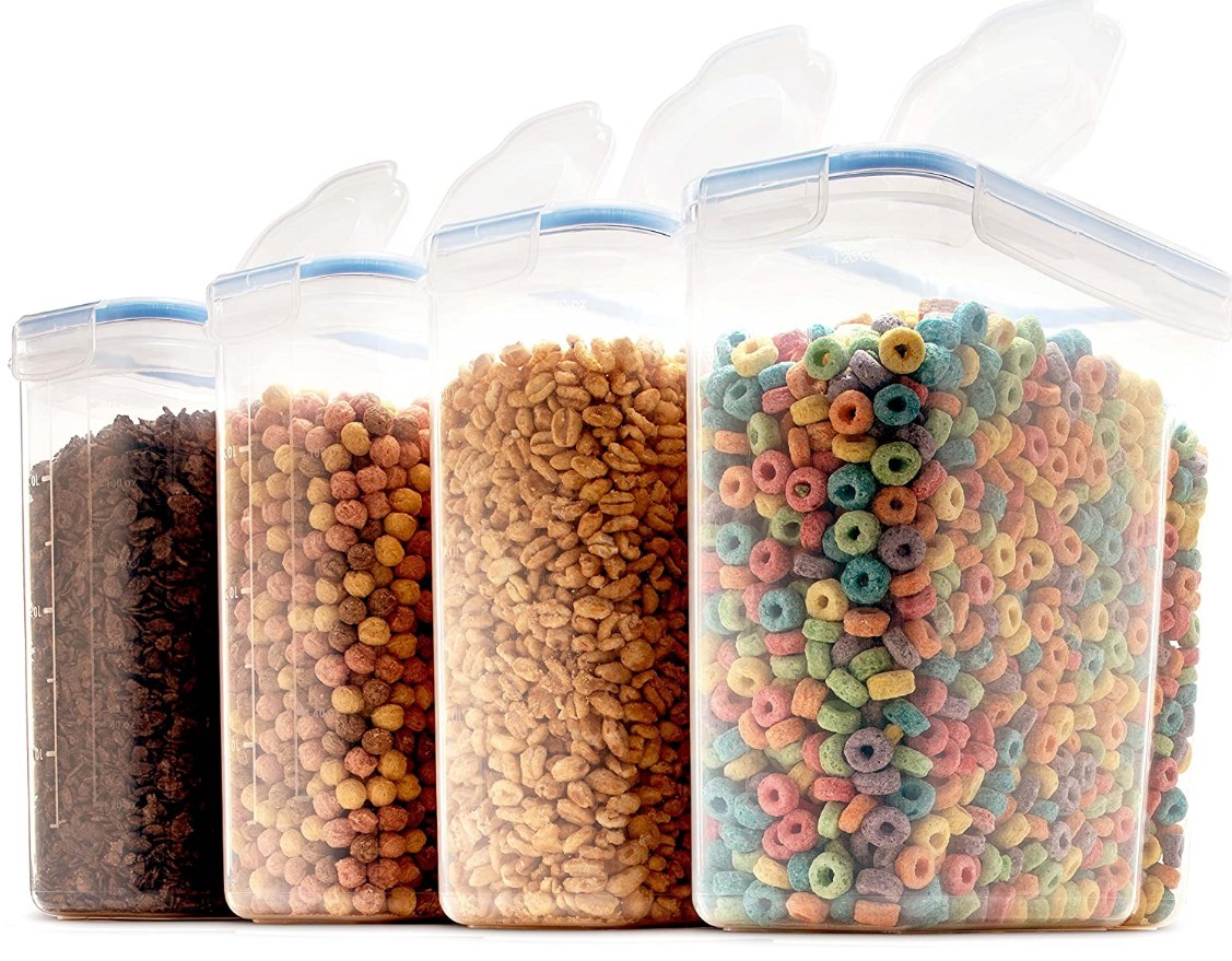 plastic cereal containers full of different cereals