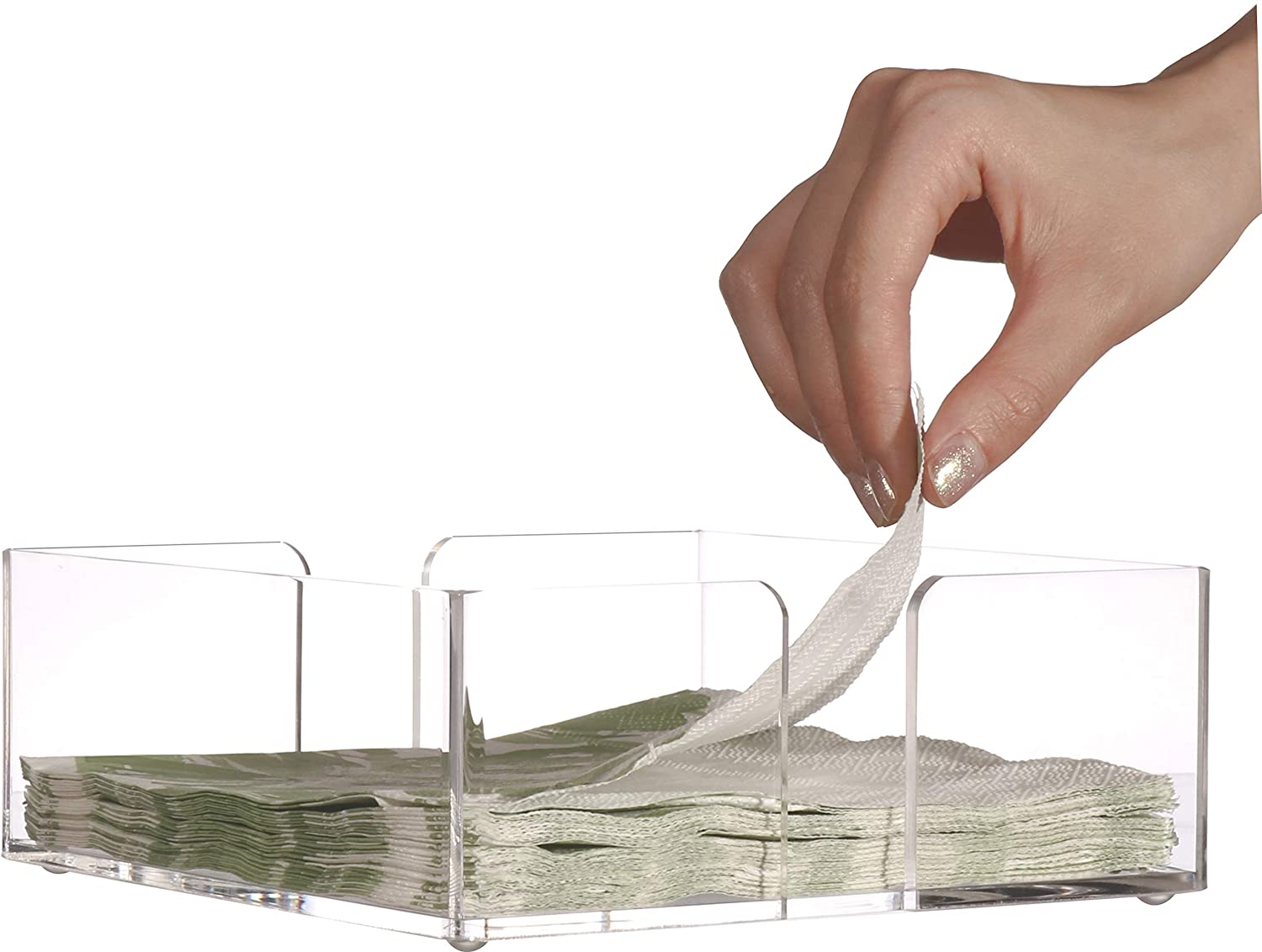 persons hand taking napkin out of clear acrylic napkin holder