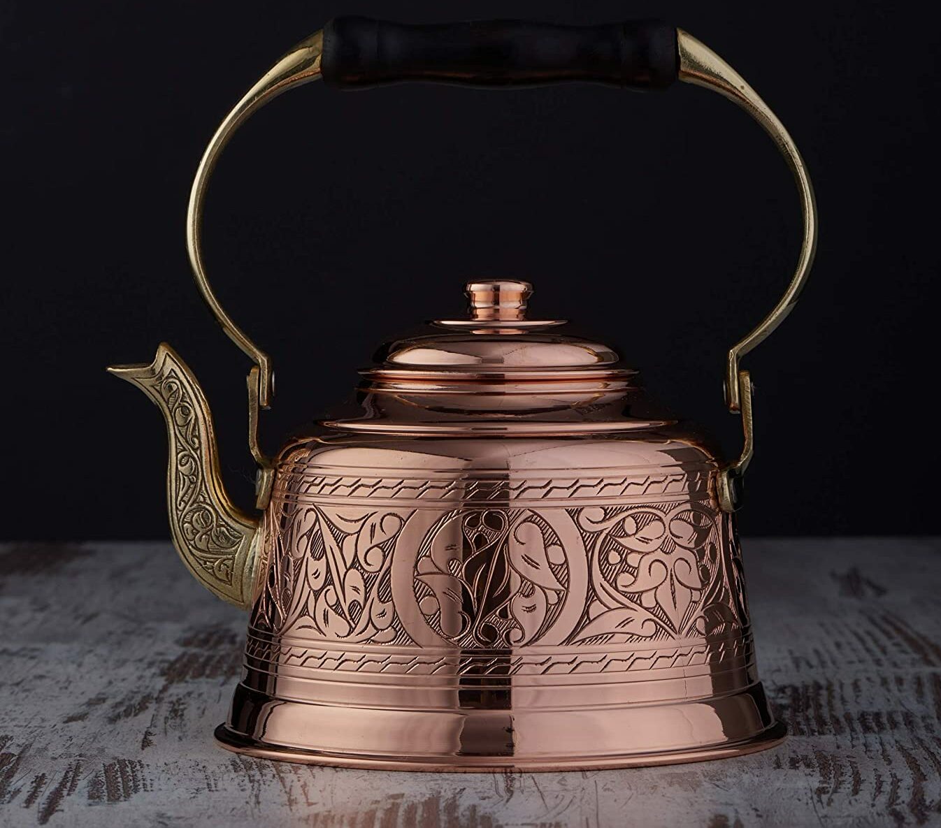 engraved copper tea kettle