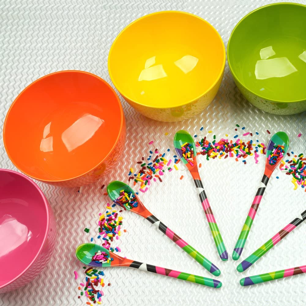 colorful bowls with patterened spoons and sprinkles