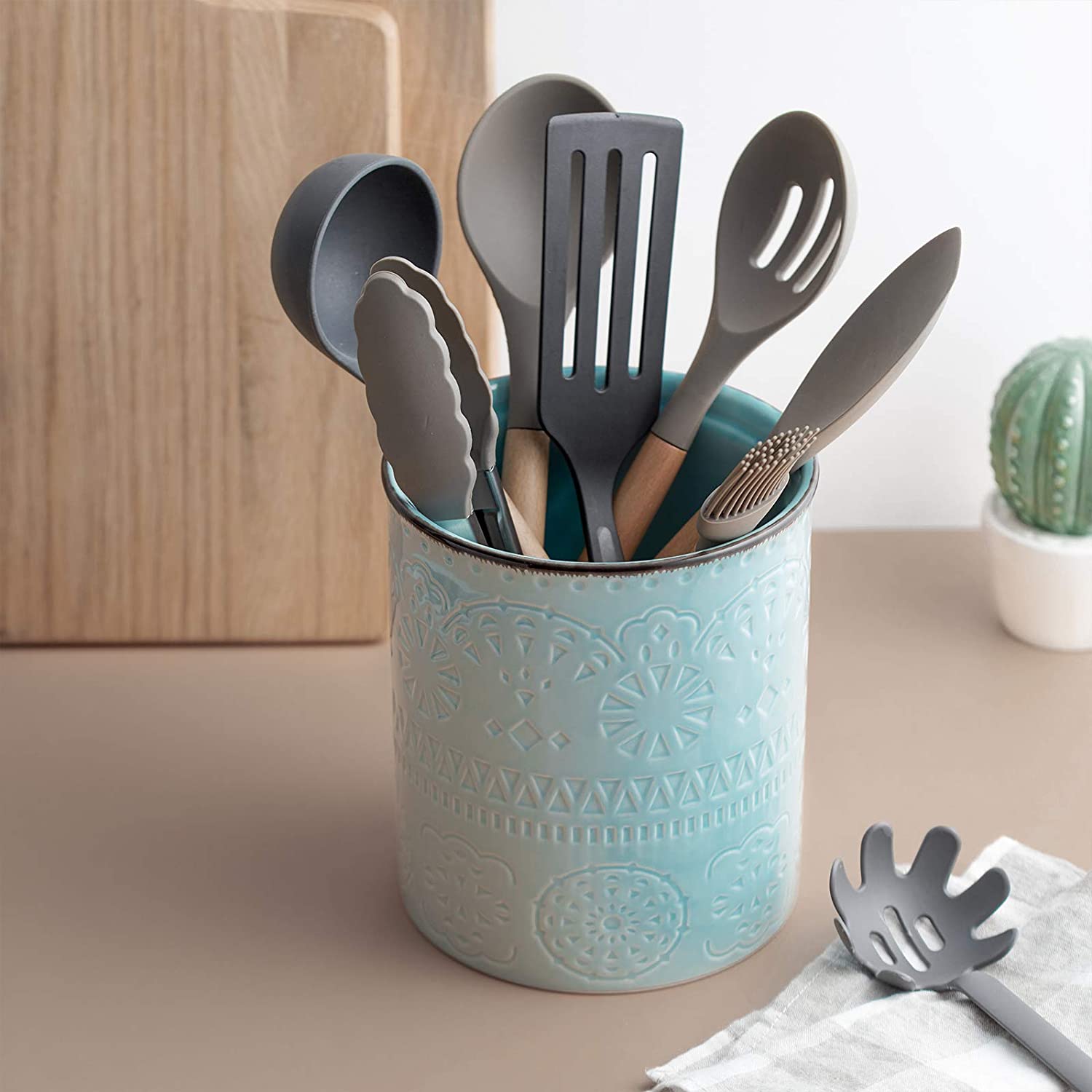 blue ceramic kitchen utensil holder