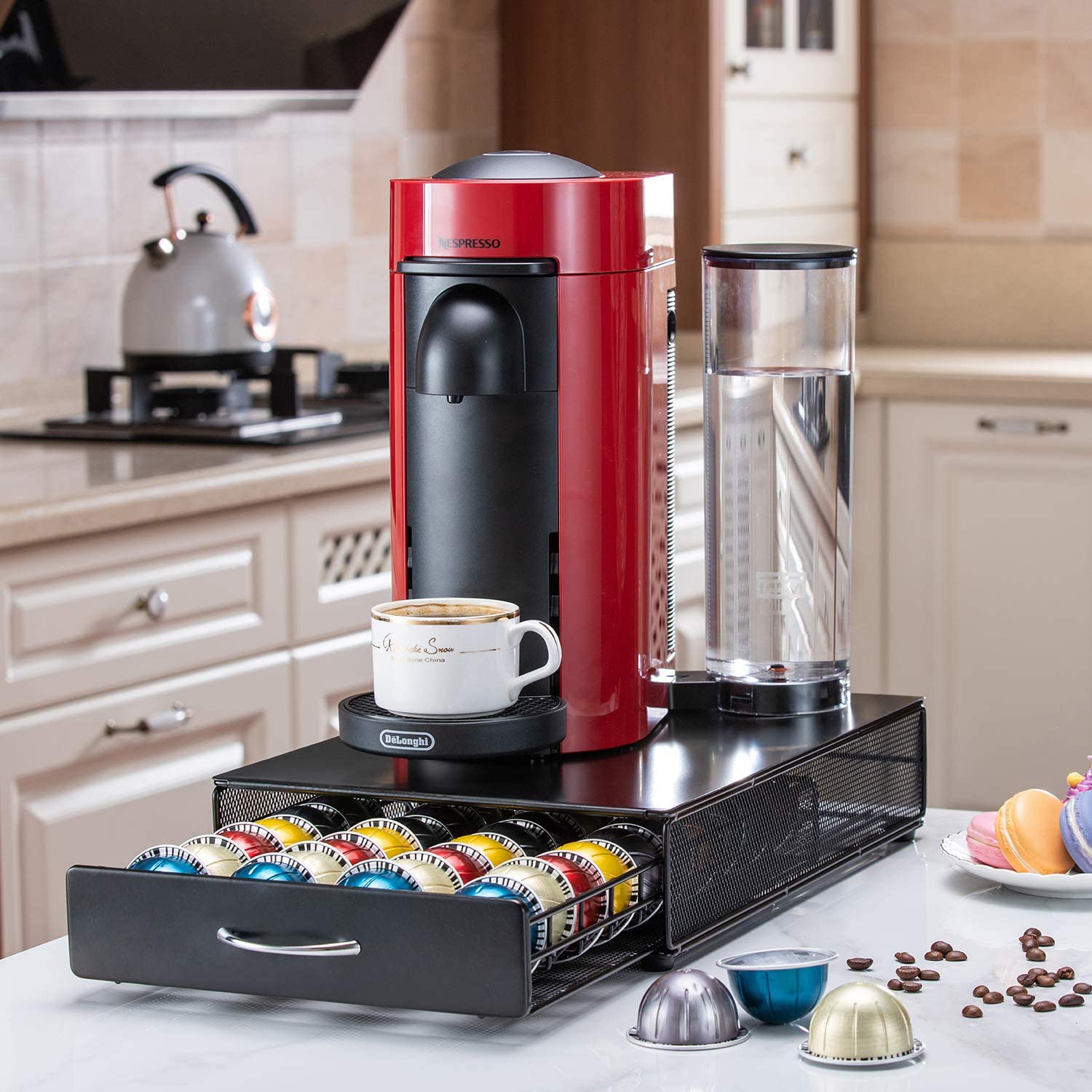 nespresso machine on counter with mug of coffee