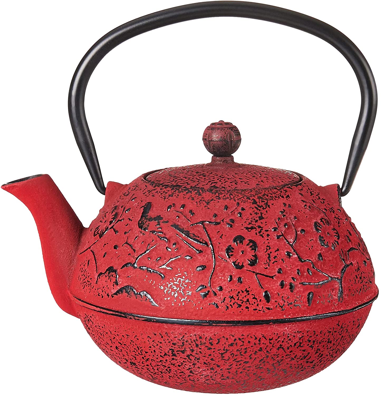 red iron tea pot with floral pattern