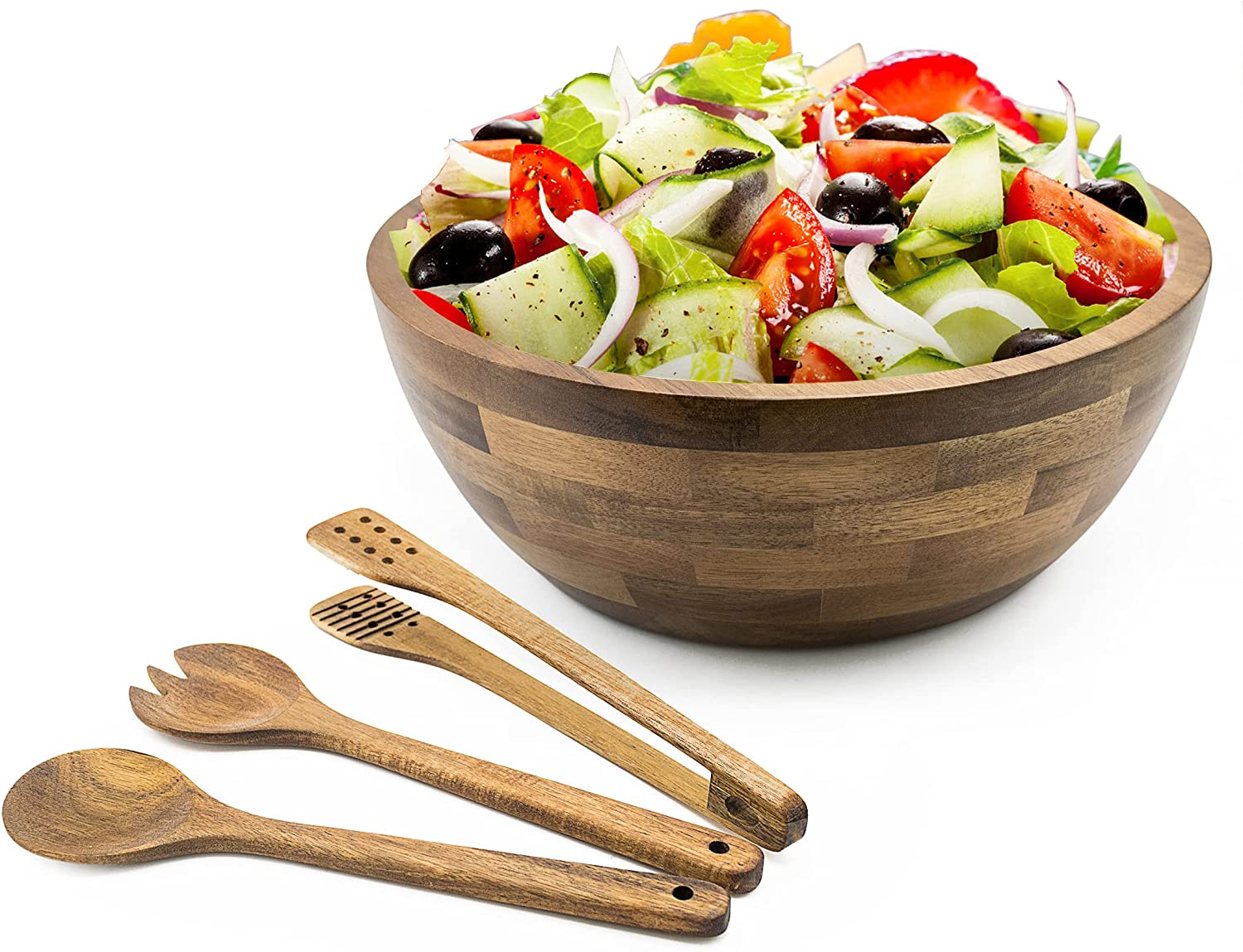 full salad bowl with wooden accessories