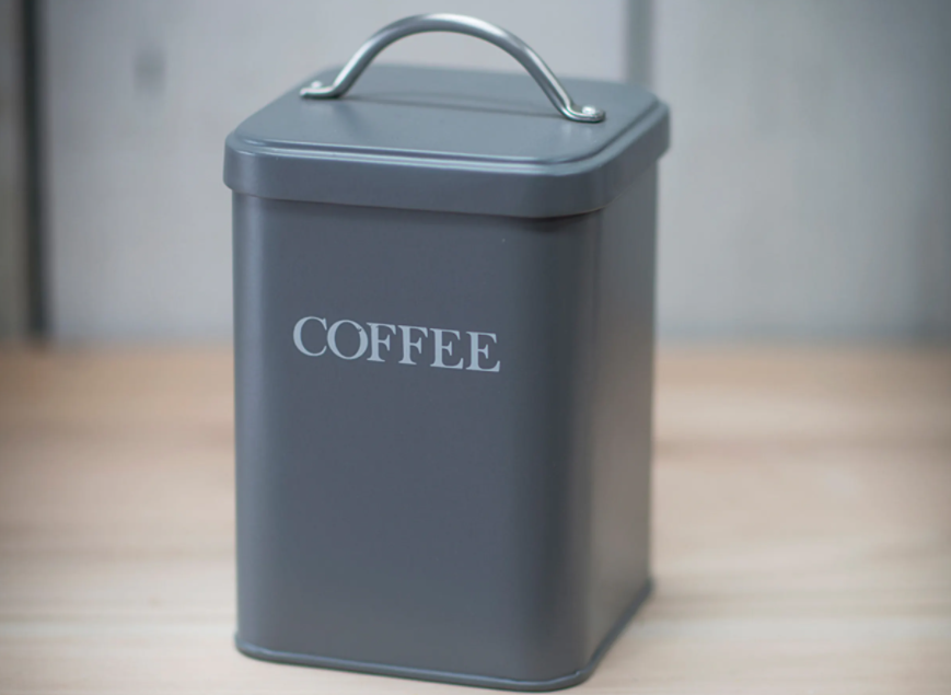 square coffee canister labeled with coffee