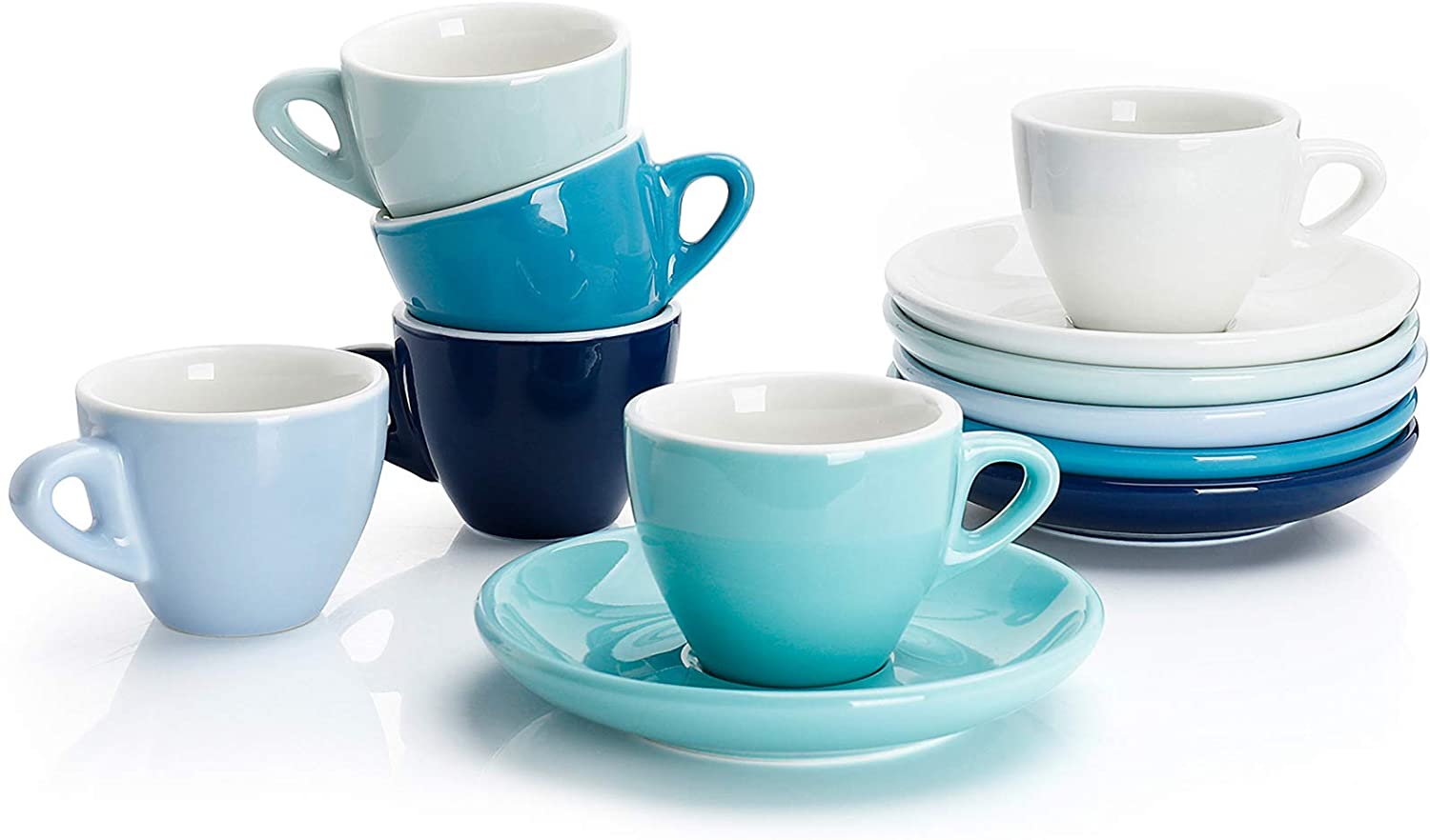 stacks of different blue colored espresso cups and saucers