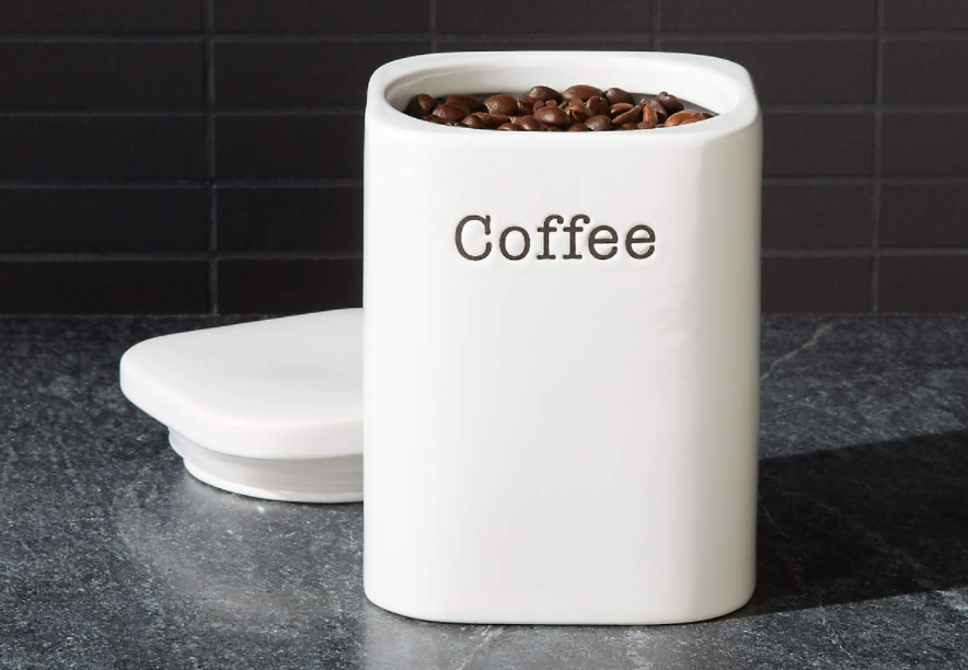 white ceramic labeled coffee canister